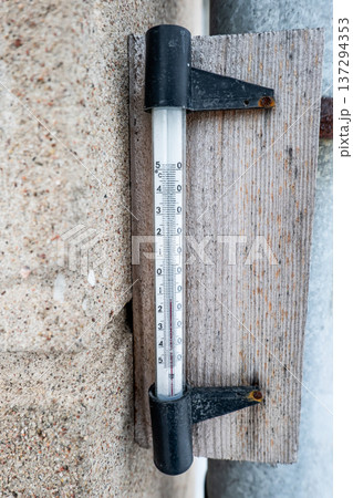 Outdoor Thermometer Showing Frost And Cold Weather Conditions In Winter Outdoor Thermometer Showing Frost And Cold Weather Conditions In Winter 137294353