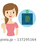 人差し指で指紋認証をする女性 137295164