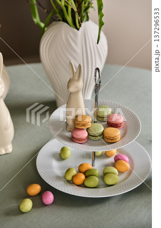 Macaron Cookies on Stand with Easter Rabbit Macaron Cookies on Stand with Easter Rabbit 137296533