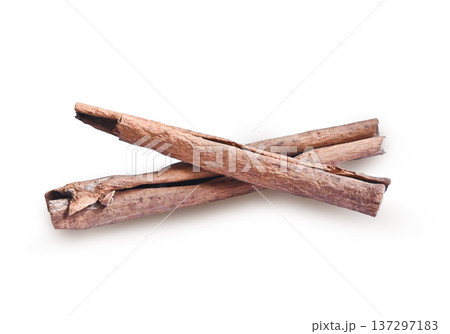 Cinnamon sticks isolated on white background. Cinnamon sticks isolated on white background. 137297183