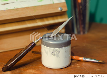 Art supplies on wooden table, celebrating creativity and painting Art supplies on wooden table, celebrating creativity and painting 137297417