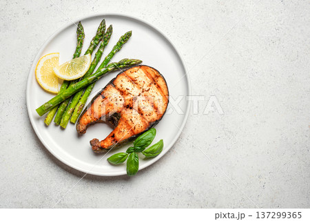 Grilled salmon fish steak and roasted asparagus 137299365