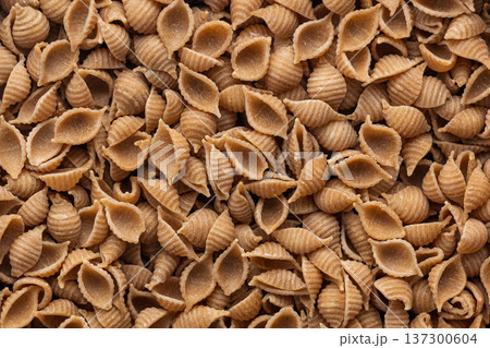 Wholegrain conchiglie pasta. Top view. 137300604