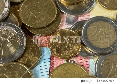 Saving and pocket money concept with Euro change. Saving and pocket money concept with Euro change. 137300707