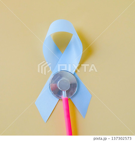 blue ribbon sign with stethoscope,health care concept. blue ribbon sign with stethoscope,health care concept. 137302573