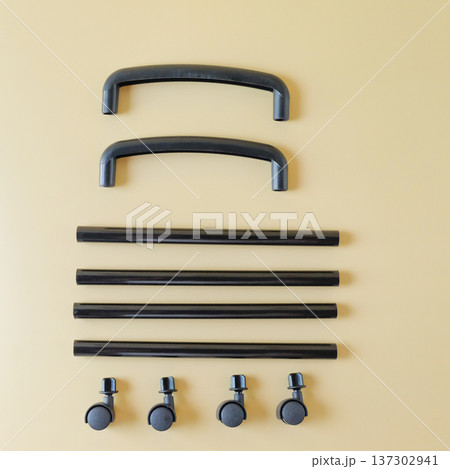 Black Plastic pipe with roller on color background. Black Plastic pipe with roller on color background. 137302941