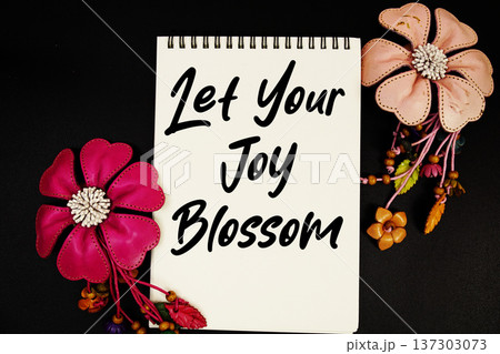Let Your Joy Blossom Motivational and Inspirational quote written on notepad 137303073