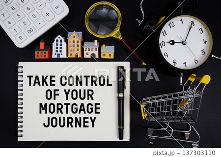 Notepad with the phrase "Take Control of Your Mortgage Journey" surrounded by a pen, calculator, magnifying glass, clock, mini trolley shopping cart and house model Notepad with the phrase "Take Control of Your Mortgage Journey" surrounded by a pen, calculator, magnifying glass, clock, mini trolley shopping cart and house model 137303110