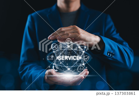 Customer service concept, businessman protecting digital globe with service icons representing global support, technical assistance, online communication, cybersecurity and 24/7 business solutions. 137303861