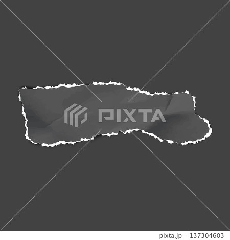 A crumpled black piece of paper with a white torn edge on a dark isolated background. 137304603