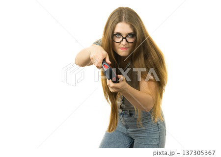 Gamer woman holding gaming pad Gamer woman holding gaming pad 137305367