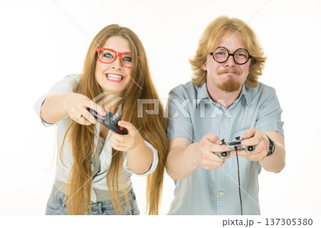 Gaming couple playing games 137305380
