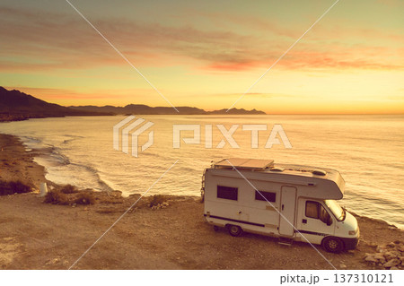 Caravan on sea coast at sunrise. Aerial view Caravan on sea coast at sunrise. Aerial view 137310121