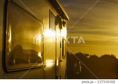 Camper car on nature at sunrise 137310168