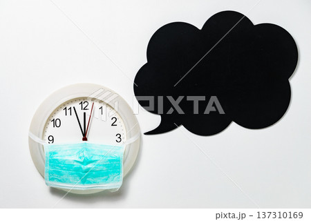 Face protection mask on clock show 12 hours, time lapse Face protection mask on clock show 12 hours, time lapse 137310169