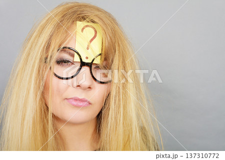 Tired crazy woman after intensive thinking 137310772