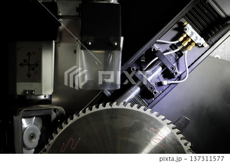 close up of circular saw blade sharpening machine 137311577