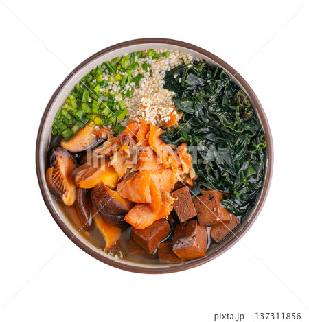 Top down view of a ceramic bowl of healthy Japanese style soup Top down view of a ceramic bowl of healthy Japanese style soup 137311856