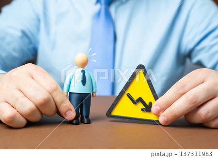 Staff reductions and layoffs. Salary cuts and low worker productivity amid corporate downsizing cost optimization and restructuring during economic slowdown. 137311983