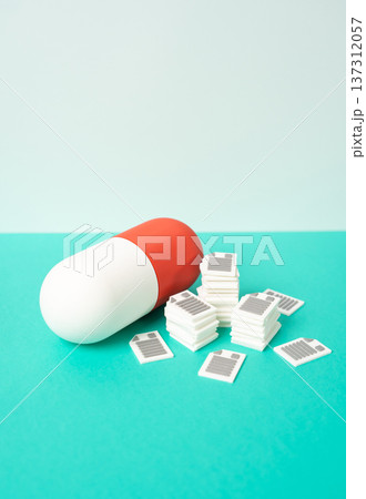 A medicinal capsule and a mountain of documentation. Clinical drug trials. Side effects and indications research in pharmaceutical development and regulatory approval process. 137312057