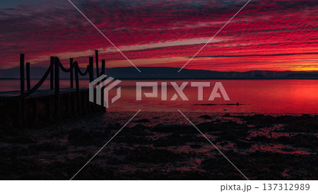 Sunrise of a wooden pier 137312989