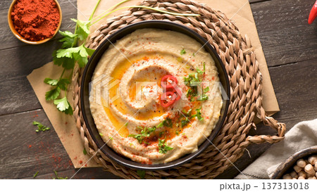 Delicious hummus in ceramic bowl Delicious hummus in ceramic bowl 137313018