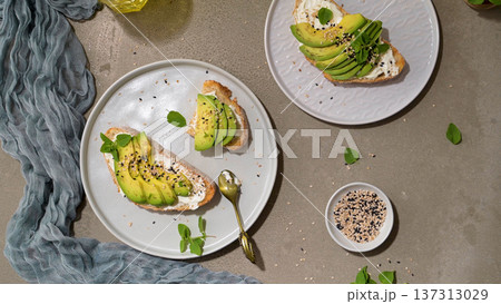 Toast with avocado cream cheese and wheat bread Toast with avocado cream cheese and wheat bread 137313029