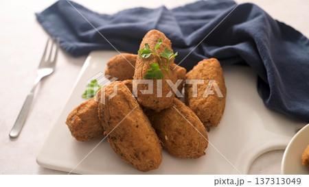 Cod dumplings or bolinhos de bacalhau Cod dumplings or bolinhos de bacalhau 137313049