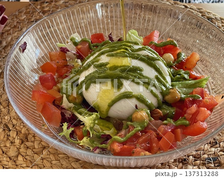 Burrata with Tomato and Avocado Salad 137313288