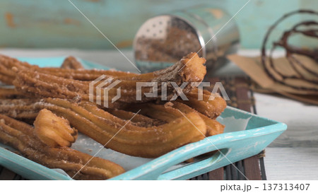 Traditional churros with hot chocolate Traditional churros with hot chocolate 137313407