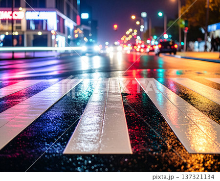 Urban crosswalk at night with neon lights reflecti Urban crosswalk at night with neon lights reflecti 137321134