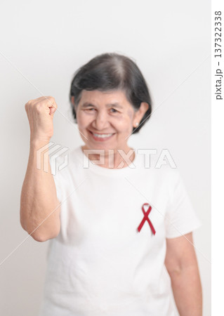 Elderly with Burgundy Ribbon for March Multiple Myeloma Cancer Awareness month, September Sickle Cell Anemia, Headache and Migraine week, April world Meningitis day, October Hospice  Palliative care 137322338