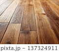 Natural wooden flooring with warm, rustic texture and detailed wood grain pattern 137324911