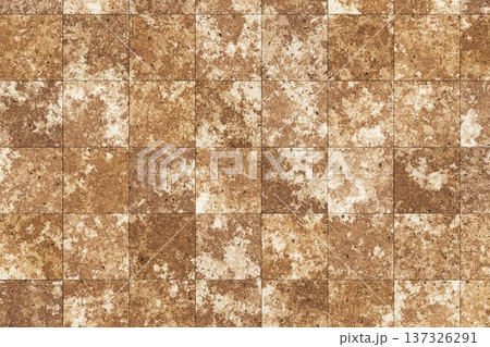 Rustic brown stone tiles texture with weathered aged effect for architectural background design Rustic brown stone tiles texture with weathered aged effect for architectural background design 137326291