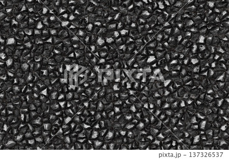 Shiny black coal texture background with small glossy rock fragments and mineral surface. 137326537