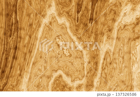 Intricate swirling wood grain burl pattern with golden yellow tones for luxury surface design. 137326586