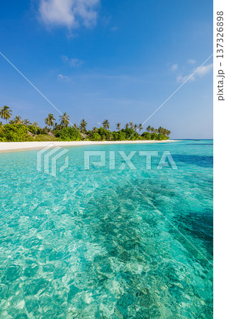Majestic tropical beach with amazing ocean water for dream destination travel background in pristine paradise. Perfect vertical wallpaper Majestic tropical beach with amazing ocean water for dream destination travel background in pristine paradise. Perfect vertical wallpaper 137326898