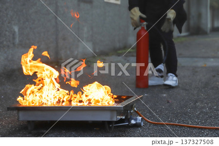 corporate safety - exercise during a firefighting course 137327508