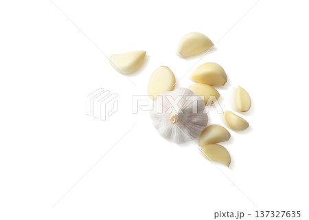 Peeled Garlic and Bulb Culinary Elements with Large Negative Space for Text Peeled Garlic and Bulb Culinary Elements with Large Negative Space for Text 137327635