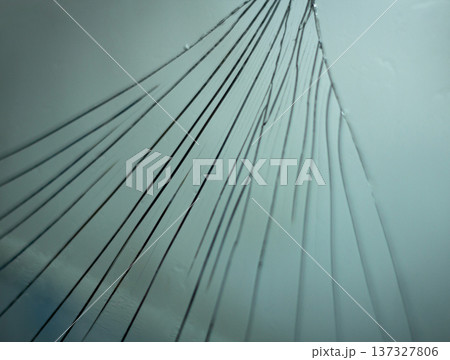 Cracked mirror symbolizing broken identity and emotional damage.Single teardrop on glass symbolizing emotional pain and sorrow. Cracked mirror symbolizing broken identity and emotional damage.Single teardrop on glass symbolizing emotional pain and sorrow. 137327806