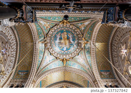Lyon, france. December 27,2023. Basilica notre dame de fourviere ceiling showing intricate mosaic art depicting religious figures and gold patterns in lyon, france Lyon, france. December 27,2023. Basilica notre dame de fourviere ceiling showing intricate mosaic art depicting religious figures and gold patterns in lyon, france 137327842