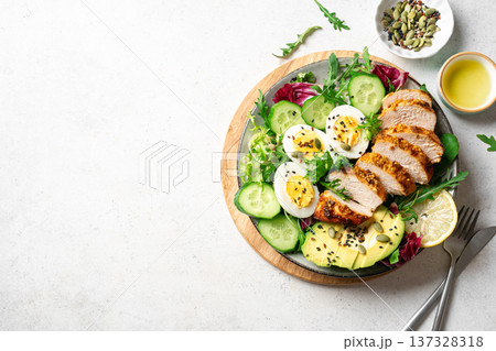 High protein lunch bowl with chicken, eggs and vegetables High protein lunch bowl with chicken, eggs and vegetables 137328318
