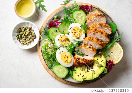 High protein lunch bowl with chicken, eggs and vegetables High protein lunch bowl with chicken, eggs and vegetables 137328319