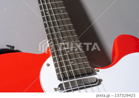 Electric Guitar Body Close-Up on gray background 137329425
