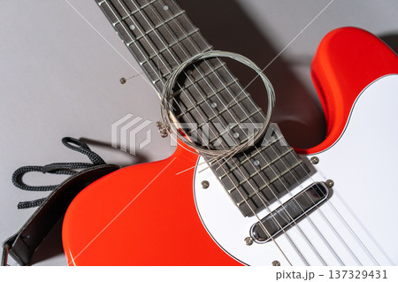 Red Guitar with Coiled Strings Red Guitar with Coiled Strings 137329431
