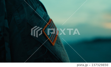 American Flag Memorial Day on a Soldiers Arm on the Beach After Sunset 137329850