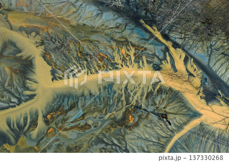 Aerial view of colorful natural water patterns. Mining water pollution Aerial view of colorful natural water patterns. Mining water pollution 137330268