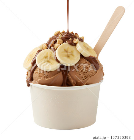Delicious cup of rich chocolate ice cream topped with fresh banana slices, crunchy nuts, and drizzled chocolate syrup, isolated 137330398