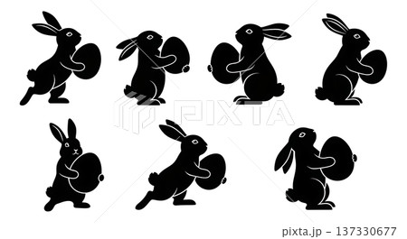 Black Solid Bunnies Holding Eggs Silhouettes Set of Six on White Background 137330677