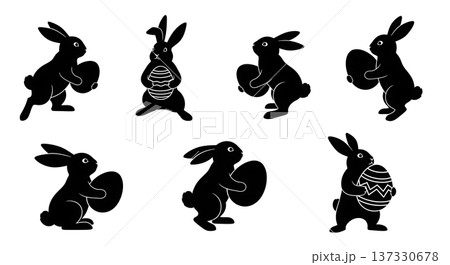 Black Solid Bunnies Holding Eggs Silhouettes Set of Six on White Background Black Solid Bunnies Holding Eggs Silhouettes Set of Six on White Background 137330678